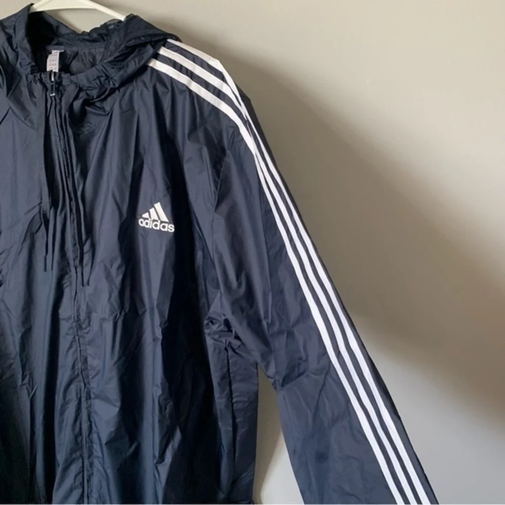 NWT. ADIDAS Primegreen Essentials 3-Stripes Men’s Windbreaker